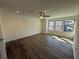 A naturally lit bedroom featuring hardwood floors and a ceiling fan at 3904 Allegretto Cir # 50, Atlanta, GA 30339