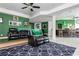 Finished basement with Michigan State decor, including a bar and entertainment area at 3963 Hazelhurst Lake Dr, Marietta, GA 30066