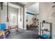 Well-equipped home gym featuring rubber flooring, pull up bar and weight lifting equipment at 3963 Hazelhurst Lake Dr, Marietta, GA 30066