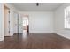 Spacious main bedroom featuring hardwood floors, a ceiling fan, and ample closet space at 4162 Lake Mist Nw Dr, Kennesaw, GA 30144