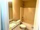 Cozy bathroom with granite vanity, toilet, and shower/tub combination at 4421 Fulson Dr, Lilburn, GA 30047