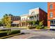 Attractive storefront featuring outdoor dining and well-manicured landscaping at 5005 Crestline View Rd, Cumming, GA 30028