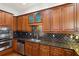 Beautiful kitchen featuring granite countertops, stainless steel appliances, and custom cabinetry at 556 Moreland Ne Ave # J, Atlanta, GA 30307