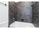 Walk-in shower featuring subway tile surround and updated shower head at 556 Moreland Ne Ave # J, Atlanta, GA 30307