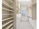 Spacious walk-in closet with custom shelving and natural lighting at 556 Moreland Ne Ave # J, Atlanta, GA 30307