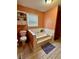 Bright bathroom features a built-in tub, window for natural light, and a tiled floor at 1536 Hunters Cv, Auburn, GA 30011