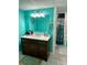 Bathroom with a modern vanity, marble countertop, large mirror, and a shower/tub combo at 1536 Hunters Cv, Auburn, GA 30011