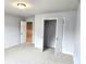 Cozy bedroom with neutral carpet, closet, and open doorway to the rest of the home at 680 Sundial Ln, Mableton, GA 30126