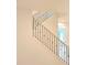 Bright staircase featuring modern black iron railings and an elegant light wood banister at 680 Sundial Ln, Mableton, GA 30126
