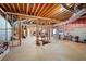 Unfinished basement featuring exposed wooden beams, ductwork, and framing, offering potential for customization at 811 Weeping Willow Dr, Powder Springs, GA 30127
