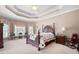 Inviting bedroom with a large bed, decorative quilt, and bright natural light at 811 Weeping Willow Dr, Powder Springs, GA 30127