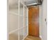 Hallway with frosted glass partition and wood door at 1029 Piedmont Ne Ave # 101, Atlanta, GA 30309