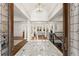 Grand foyer featuring marble floors, soaring columns, and an open view to the living spaces at 3128 Lower Roswell Rd, Marietta, GA 30068