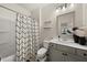 Bathroom featuring vanity and shower with patterned curtain at 372 Garnet Dr, Acworth, GA 30101