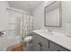 Well-lit bathroom with a shower-tub combination and a stylish vanity with sink at 372 Garnet Dr, Acworth, GA 30101