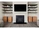 Close up view of fireplace with open shelves at 372 Garnet Dr, Acworth, GA 30101