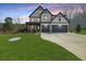 Charming two-story home with a well-maintained lawn, perfect for suburban living at 372 Garnet Dr, Acworth, GA 30101