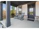 Inviting front porch featuring rocking chairs, offering a cozy and welcoming entrance at 372 Garnet Dr, Acworth, GA 30101