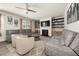 Living room featuring fireplace, shelving, and comfortable seating at 372 Garnet Dr, Acworth, GA 30101
