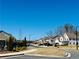 Street view of homes in a residential neighborhood with sidewalks and landscaping at 372 Garnet Dr, Acworth, GA 30101