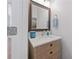 Stylish powder room with a modern vanity, marble countertop, and decorative accents at 3862 Memphis Dr, Suwanee, GA 30024