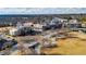 Aerial view of a public square with city hall, businesses, apartments, and landscaping at 3862 Memphis Dr, Suwanee, GA 30024