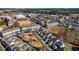 Aerial view of residential neighborhood with tree-lined streets and various home styles at 3862 Memphis Dr, Suwanee, GA 30024