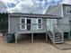 Back deck features stairs down to the back yard at 504 Harbor Lake Ct, Marietta, GA 30066