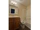 This bathroom features a tub shower, vanity and medicine cabinet at 504 Harbor Lake Ct, Marietta, GA 30066