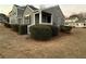 Well-maintained exterior view of home, featuring manicured shrubs and a tidy lawn at 504 Harbor Lake Ct, Marietta, GA 30066