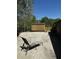Spacious backyard with large shed, concrete patio and chair for outdoor enjoyment at 101 Flagler Way, Dallas, GA 30157