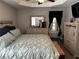 Nicely decorated bedroom with neutral colors, ceiling fan, and natural lighting at 101 Flagler Way, Dallas, GA 30157