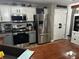 Bright kitchen with stainless steel appliances, modern cabinetry, and lots of counter space at 101 Flagler Way, Dallas, GA 30157