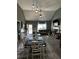 Cozy living area boasts lots of natural light, a fireplace, and an open floor plan at 101 Flagler Way, Dallas, GA 30157