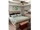 Cozy bedroom showcasing neutral tones and a decorative upholstered bench at 101 Flagler Way, Dallas, GA 30157