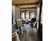 Inviting sunroom with a ceiling fan and wood floors creates a cozy, relaxing space at 101 Flagler Way, Dallas, GA 30157