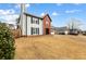 Attractive two-story home with brick and siding, showcasing its curb appeal at 1445 Wheatfield Dr, Lawrenceville, GA 30043