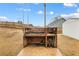 Brick outdoor grill surrounded by grassy lawn and wooden fence at 1445 Wheatfield Dr, Lawrenceville, GA 30043