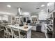 Bright, updated kitchen featuring stainless steel appliances, a center island with seating, and an open layout at 1445 Wheatfield Dr, Lawrenceville, GA 30043
