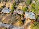 An aerial view shows the neighborhood, homes, and tree-lined streets at 2020 Wilandrew Dr, Decatur, GA 30033