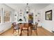 Cozy dining room with hardwood floors, built-in shelves, and ample natural light at 2020 Wilandrew Dr, Decatur, GA 30033
