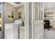 Laundry room features a washing machine, sink and windows for natural light at 2020 Wilandrew Dr, Decatur, GA 30033
