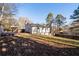 Expansive backyard with a deck, offering ample space for outdoor activities and relaxation at 2571 Hamill Dr, Buford, GA 30519