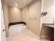 Bathroom showcasing a soaking tub and granite vanity at 2626 Peachtree Nw Rd # 1007, Atlanta, GA 30305