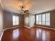 Bright bedroom with hardwood floors and modern ceiling fan at 2626 Peachtree Nw Rd # 1007, Atlanta, GA 30305