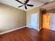 Spacious bedroom features hardwood floors and a ceiling fan at 2626 Peachtree Nw Rd # 1007, Atlanta, GA 30305