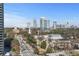 Stunning city skyline view featuring prominent buildings and lush green trees at 2626 Peachtree Nw Rd # 1007, Atlanta, GA 30305