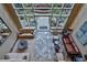 Bright living room with high ceilings, large windows, and stylish furnishings, offering a comfortable and elegant space at 2626 Peachtree Nw Rd # 1007, Atlanta, GA 30305