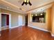 Spacious living area with hardwood floors, open to a modern kitchen and adjacent to a stylish bathroom at 2626 Peachtree Nw Rd # 1007, Atlanta, GA 30305