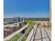 Relaxing rooftop deck with comfortable seating, lush plants, and city views, perfect for outdoor enjoyment at 2626 Peachtree Nw Rd # 1007, Atlanta, GA 30305